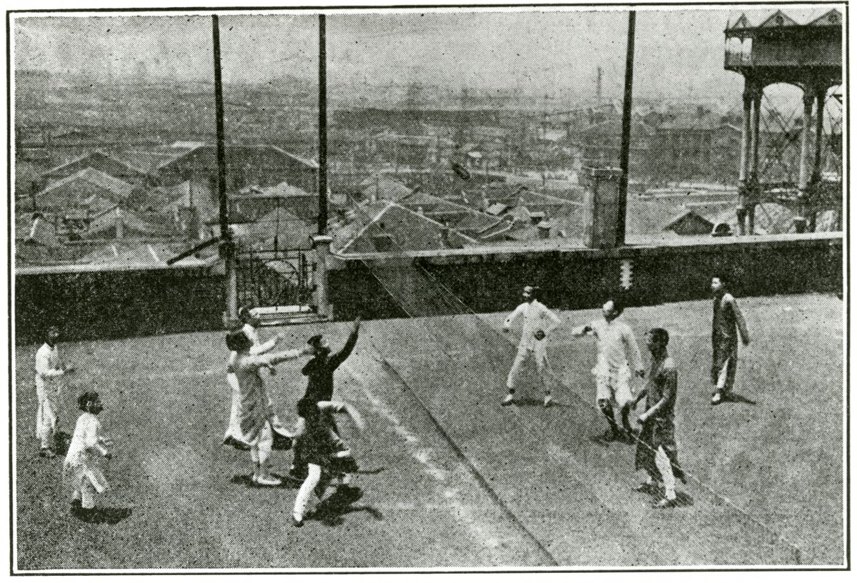 Volleyball on top of the Shanghai YMCA building in 1916